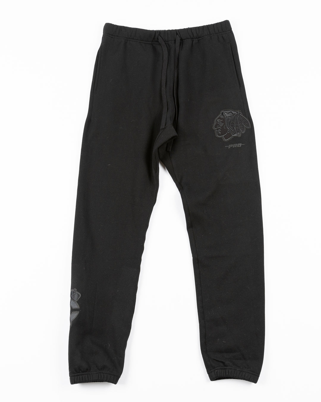 black Pro Standard sweatpants with Chicago Blackhawks embroidered tonal logos on legs - front lay flat