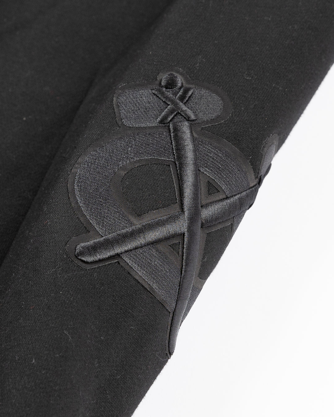 black Pro Standard sweatpants with Chicago Blackhawks embroidered tonal logos on legs - alt detail lay flat