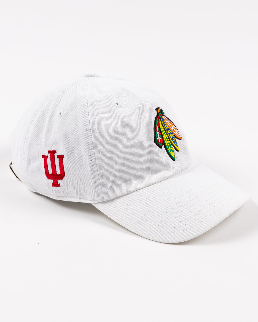 white '47 brand adjustable hat with Chicago Blackhawks four feathers logo and Indiana University logo - right angle lay flat