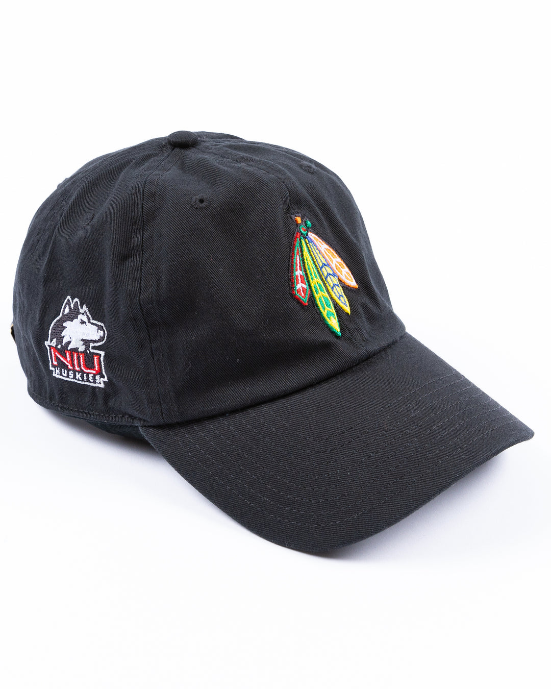 black '47 brand adjustable cap with Chicago Blackhawks four feathers embroidered on front and NIU logo embroidered on right side - right angle lay flat