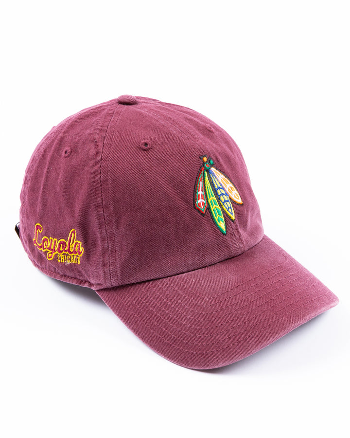 maroon '47 brand adjustable hat with Chicago Blackhawks four feathers logo embroidered on front and Loyola University Chicago logo embroidered on right side - right angle lay flat