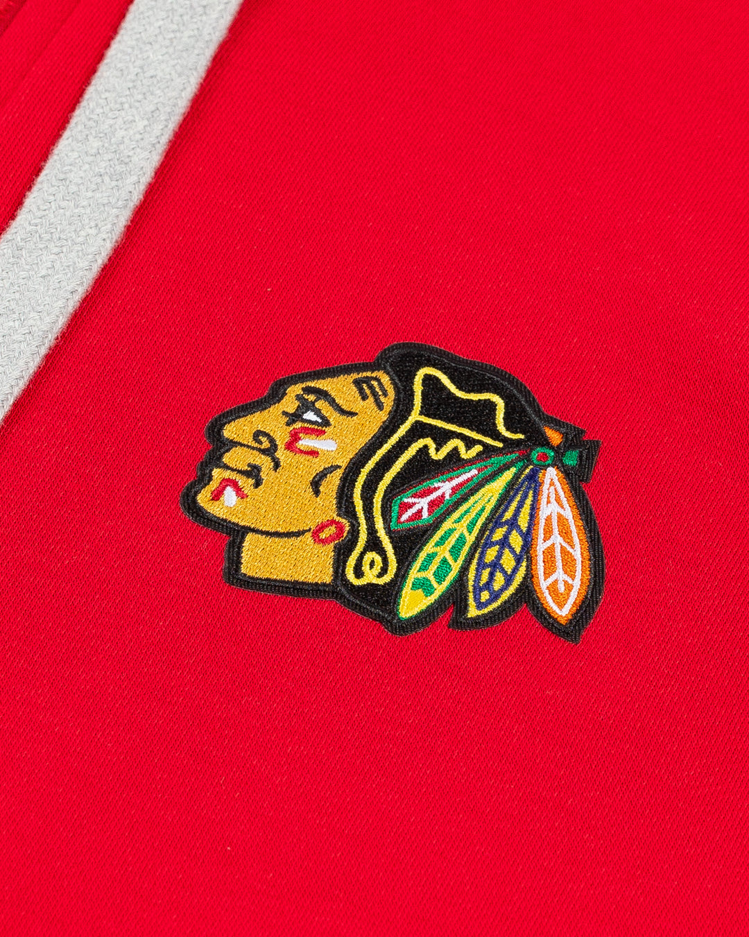 red big & tall Antigua full zip hoodie with embroidered Chicago Blackhawks primary logo on left chest - detail lay flat