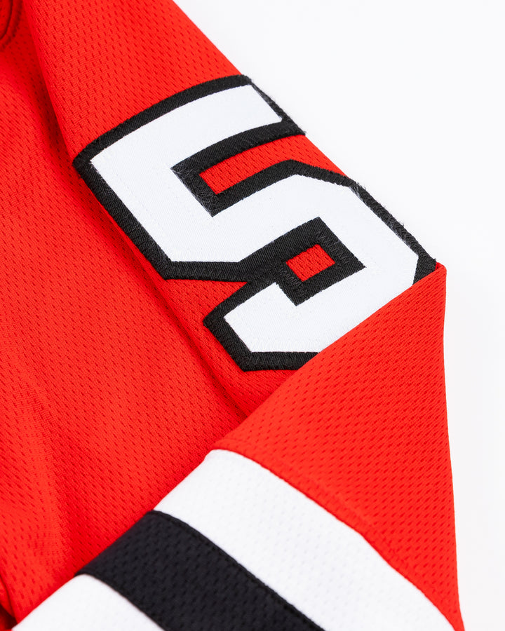 red Fanatics Chicago Blackhawks hockey jersey with stitched Connor Murphy name and number - shoulder detail lay flat