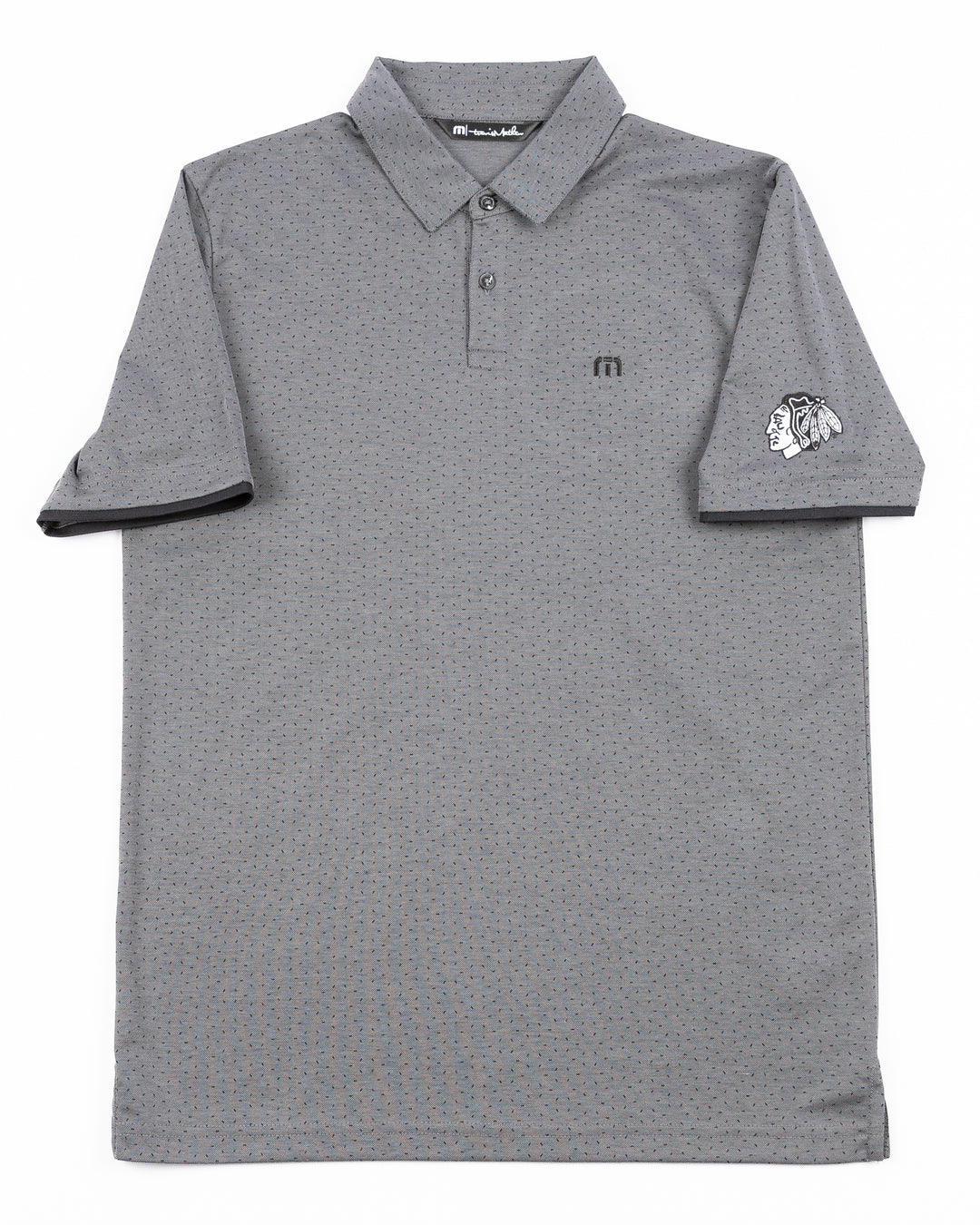 grey TravisMathew polo with Chicago Blackhawks tonal primary logo on left sleeve - front lay flat