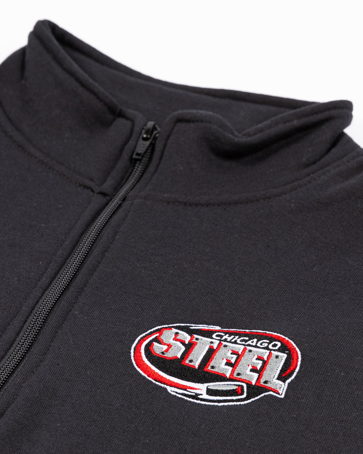 black quarter zip with Chicago Steel logo on left chest - detail  lay flat