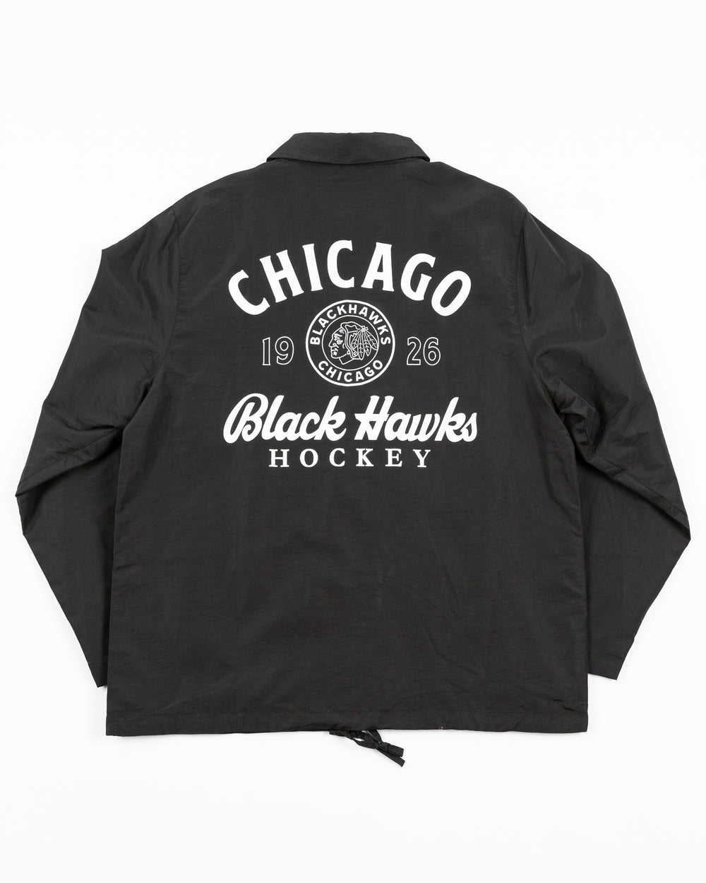 black American Needle coaches jacket with vintage Chicago Blackhawks logo on front left chest and graphic on back - back lay flat