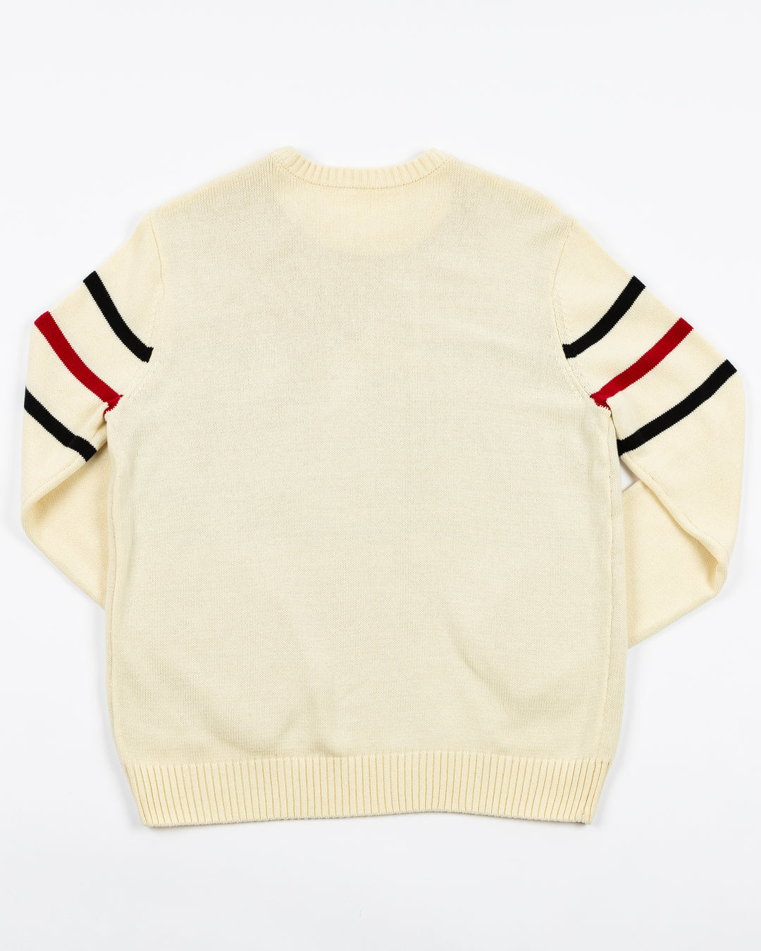 knitted ivory American Needle crewneck sweater with Chicago Blackhawks primary logo on front and stripe detailing on sleeves - back lay flat