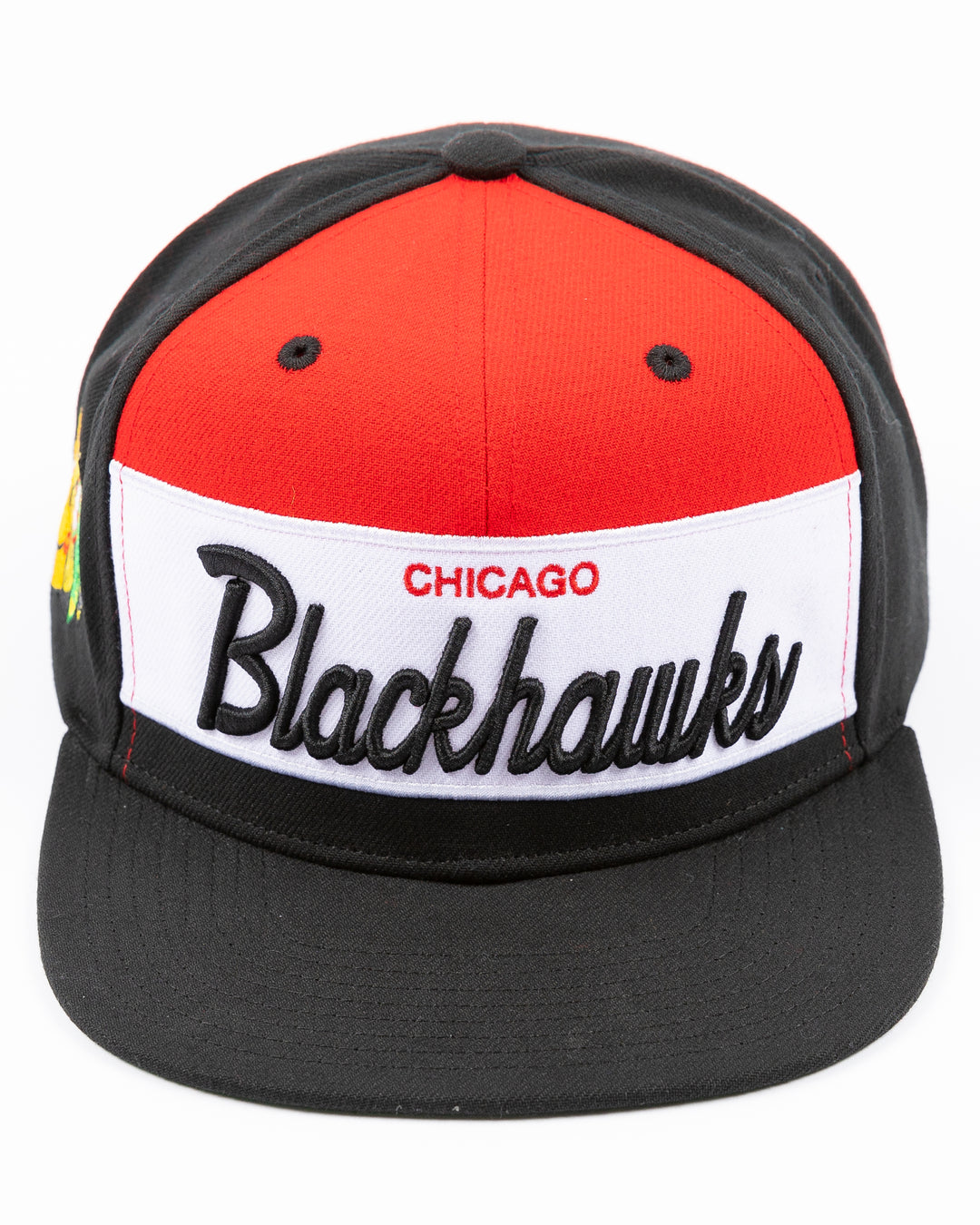 black white and red Mitchell & Ness snapback cap with Chicago Blackhawks wordmark on front and primary logo on right side - front lay flat