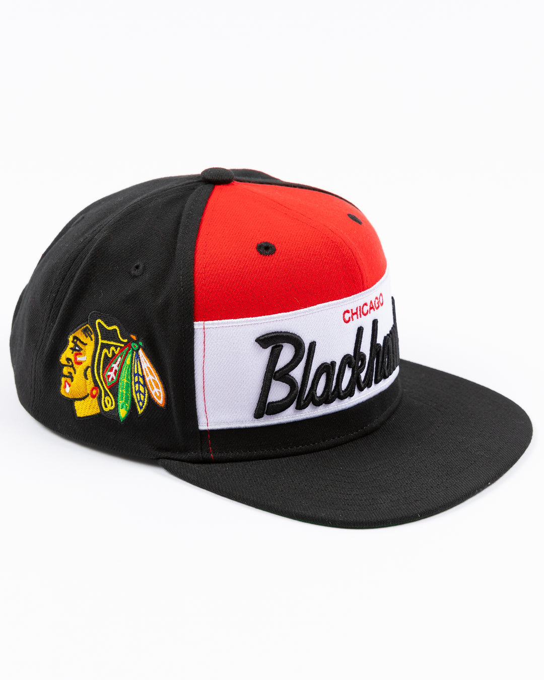 black white and red Mitchell & Ness snapback cap with Chicago Blackhawks wordmark on front and primary logo on right side - right angle lay flat