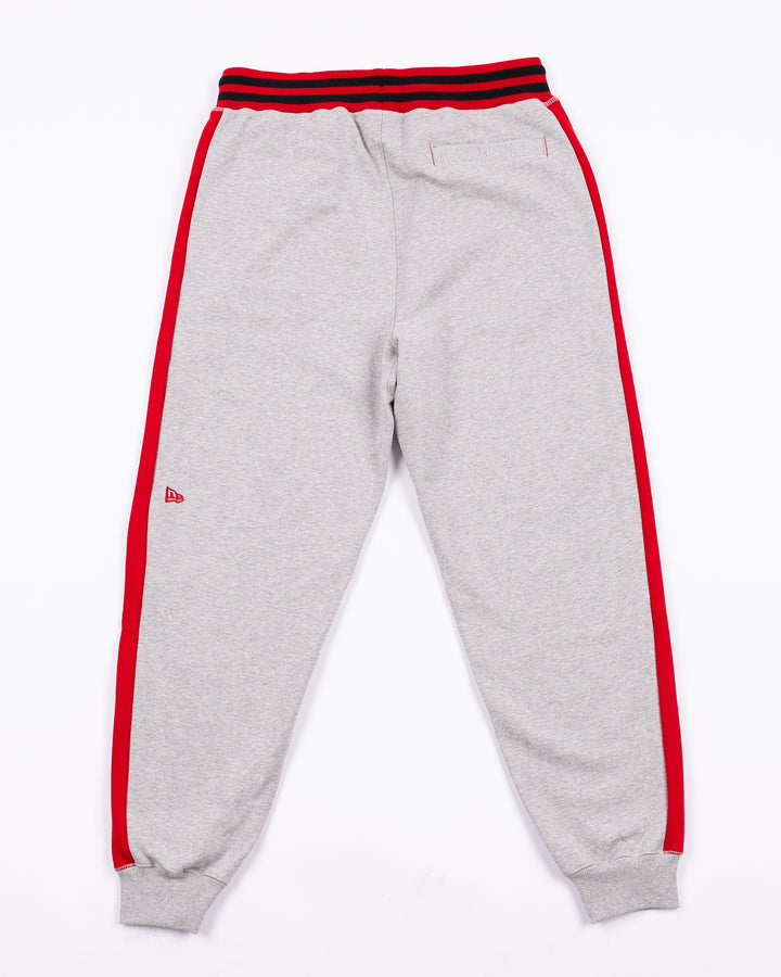 grey New Era sweatpants with embroidered Chicago Blackhawks logos and 26 on left leg - back lay flat