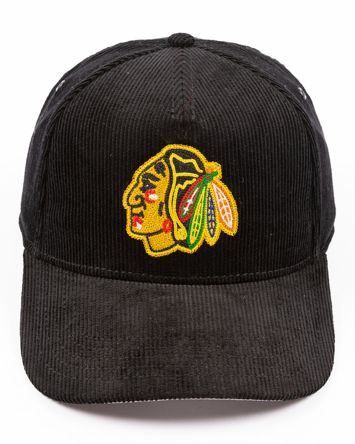 black corduroy snapback hat with chain stitch Chicago Blackhawks primary logo on front - front lay flat