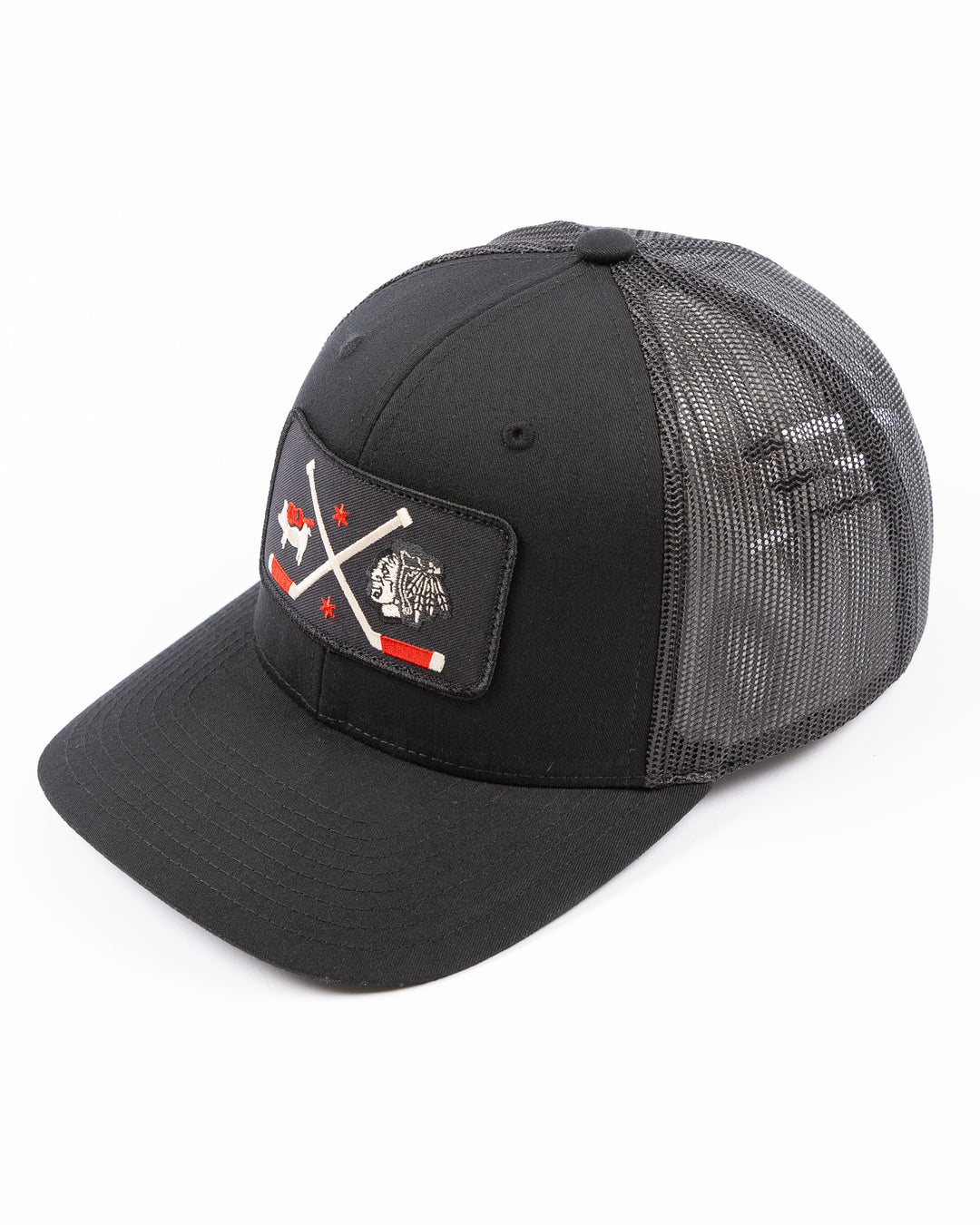 black trucker hat with patch of Windy City Smokeout logo and Chicago Blackhawks primary logo on front - left angle lay flat