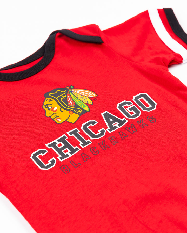 Colosseum infant Chicago Blackhawks onesie and bib set - detail front lay flat onesie only