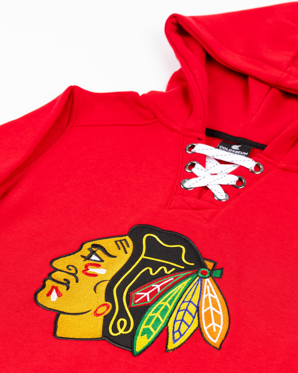 red Colosseum youth lace up hoodie with Chicago Blackhawks primary logo across front on jersey-inspired colorway - front detail lay flat