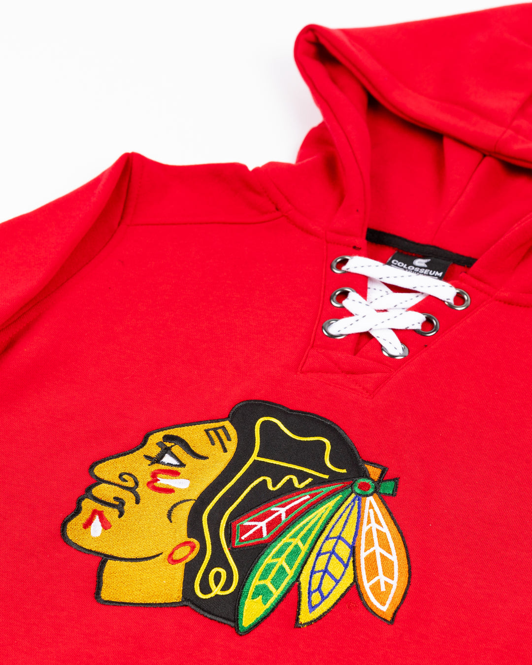 red Colosseum youth lace up hoodie with Chicago Blackhawks primary logo across front on jersey-inspired colorway - front detail lay flat