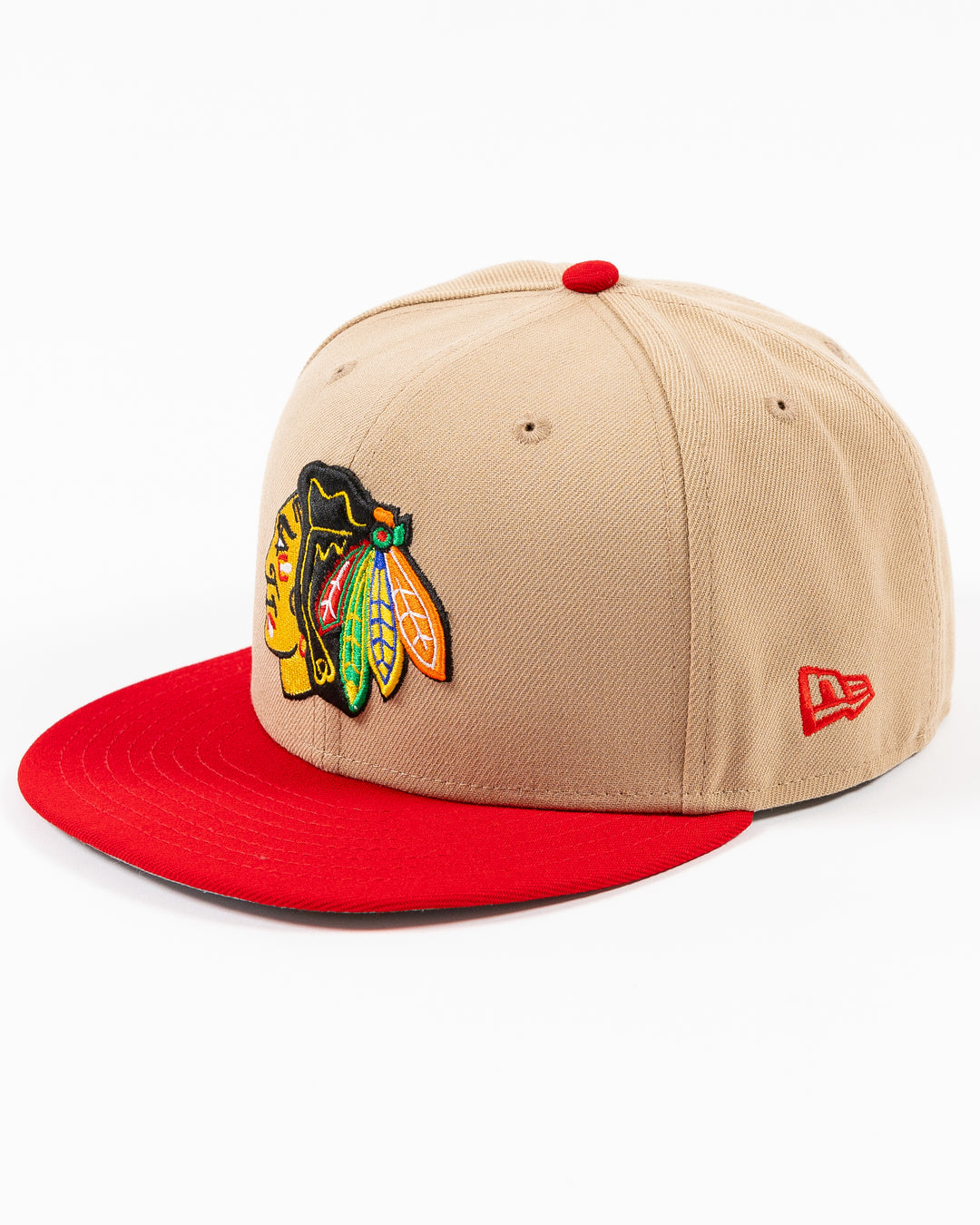 two tone camel and red New Era fitted cap with Chicago Blackhawks primary logo on front - left angle lay flat