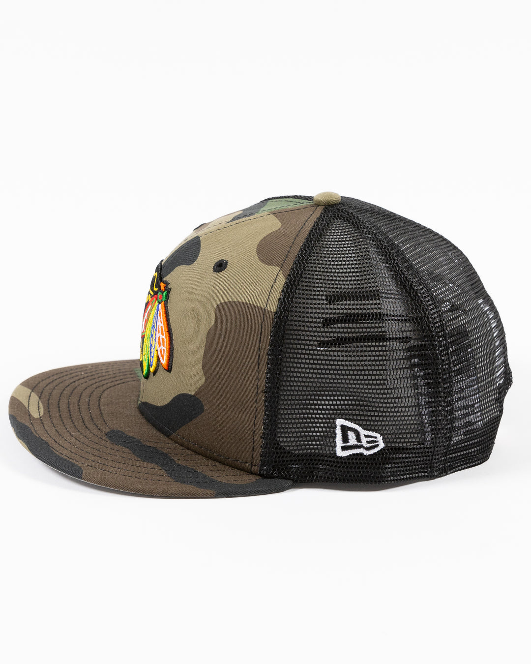 camo New Era 9FIFTY adjustable snapback cap with Chicago Blackhawks primary logo embroidered on front - left side lay flat