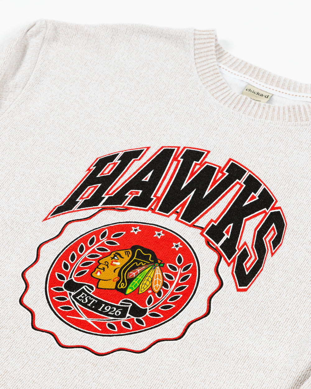 off white chicka-d sweater with Chicago Blackhawks varisty inspired graphic with Hawks wordmark and primary logo on front - detail lay flat