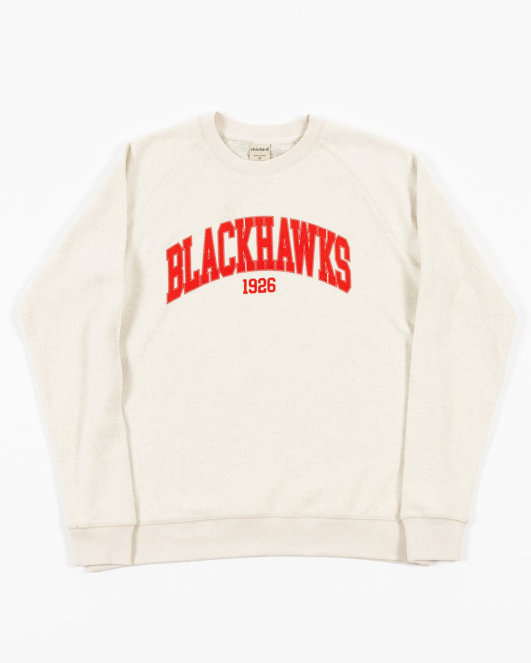 white chicka-d crewneck with Chicago Blackhawks wordmark in red across the chest - front lay flat