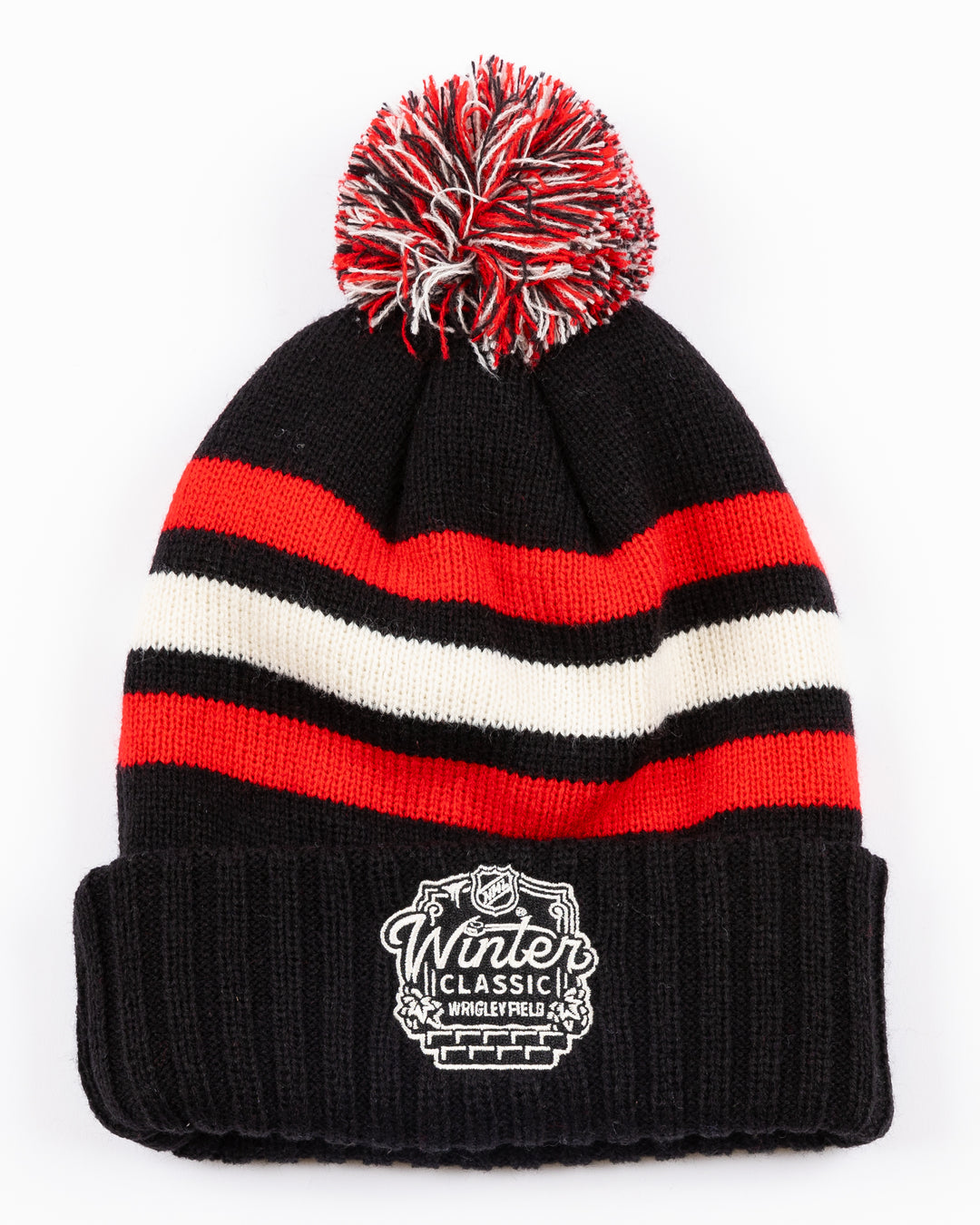 striped black white and red American Needle pom knit hat with multi color pom on top and Chicago Blackhawks and NHL Winter Classic patches embroidered on front and back - back lay flat