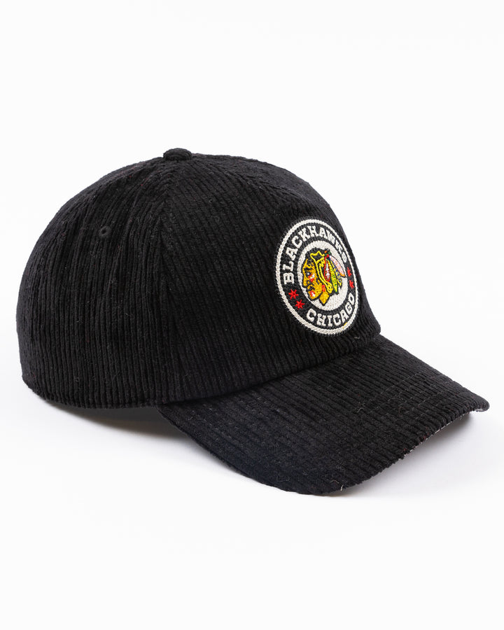 black corduroy American Needle snapback cap with Chicago Blackhawks Winter Classic logo on front and NHL Winter Classic logo on left side - right angle lay flat