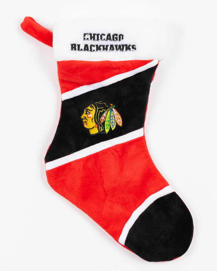 color blocked holiday stocking with Chicago Blackhawks wordmark embroidered on top and primary logo embroidered in center - front lay flat