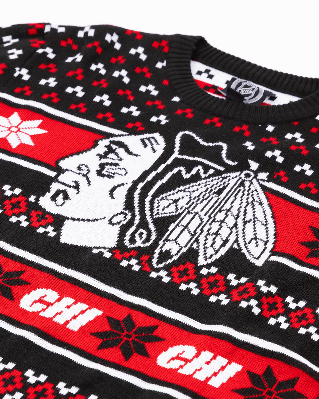 red black and white ugly Christmas sweater with Chicago Blackhawks design throughout - front detail lay flat