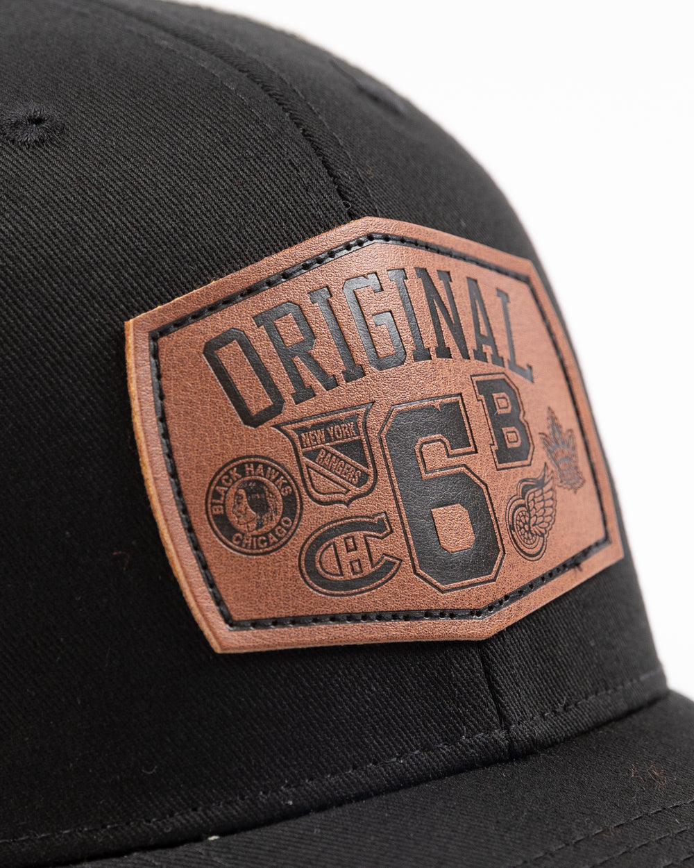 black and white Chicago Blackhawks '47 brand trucker with brown leather Original 6 patch embroidered on front - front detail lay flat
