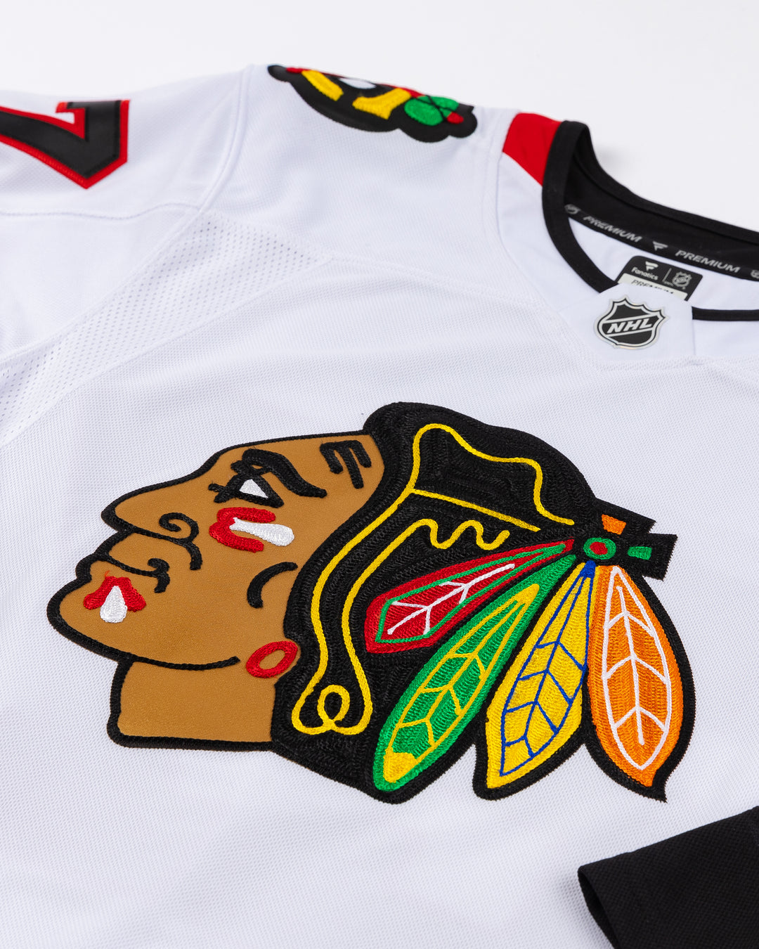 white Fanatics Chicago Blackhawks Premium jersey with Jeremy Roenick name and number - front detail lay flat