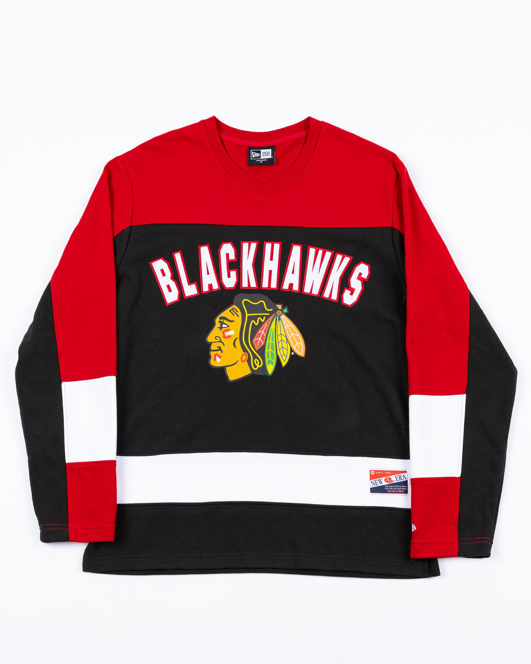 red, black and white long sleeve New Era tee with Blackhawks wordmark above Chicago Blackhawks primary logo on front - front lay flat