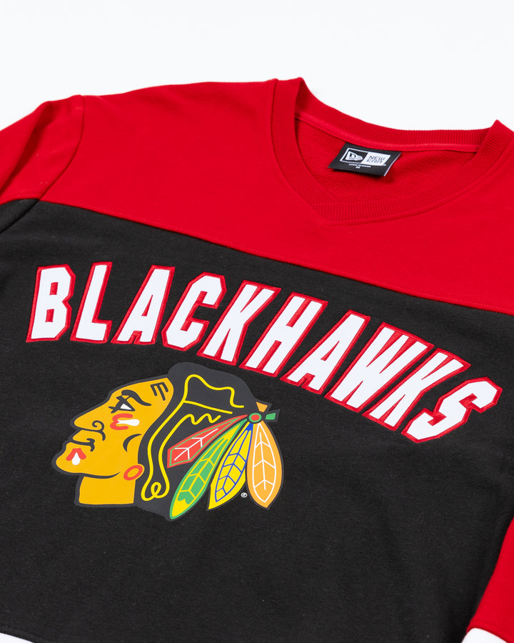 red, black and white long sleeve New Era tee with Blackhawks wordmark above Chicago Blackhawks primary logo on front - front detail lay flat