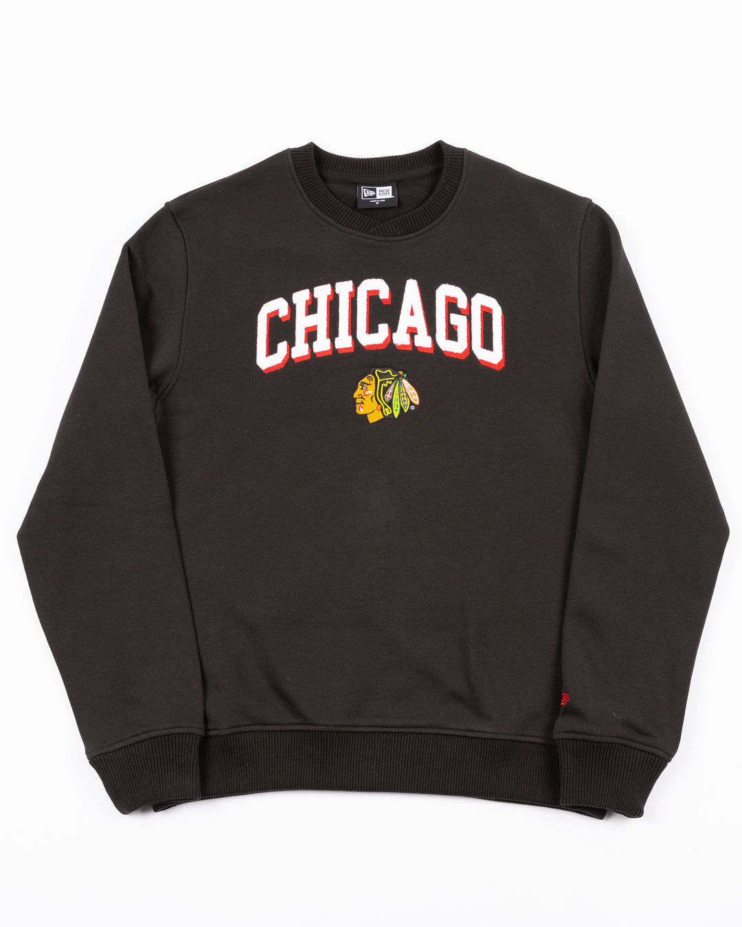 black New Era crewneck pullover sweater with Chicago wordmark in chenille above embroidered Blackhawks primary logo on front - front lay flat