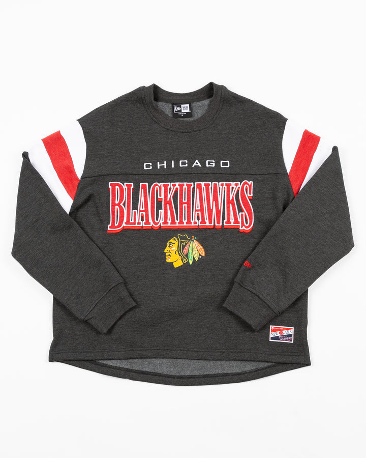 black New Era ladies crewneck with Chicago Blackhawks wordmark graphic above primary logo across front - front lay flat