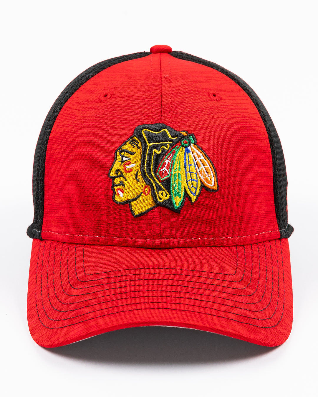 two tone red and black New Era cap with Chicago Blackhawks primary logo embroidered on front - front lay flat