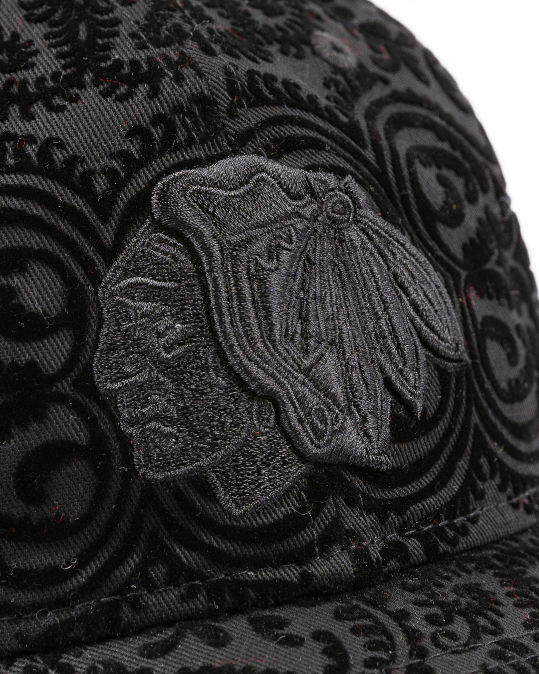 black New Era ladies hat with textured design and tonal Chicago Blackhawks primary logo embroidered on front - front detail lay flat