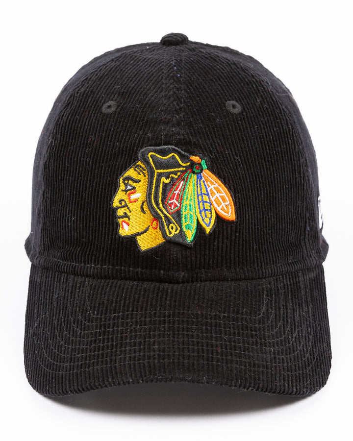 black corduroy New Era adjustable hat with embroidered Chicago Blackhawks primary logo on front - front lay flat