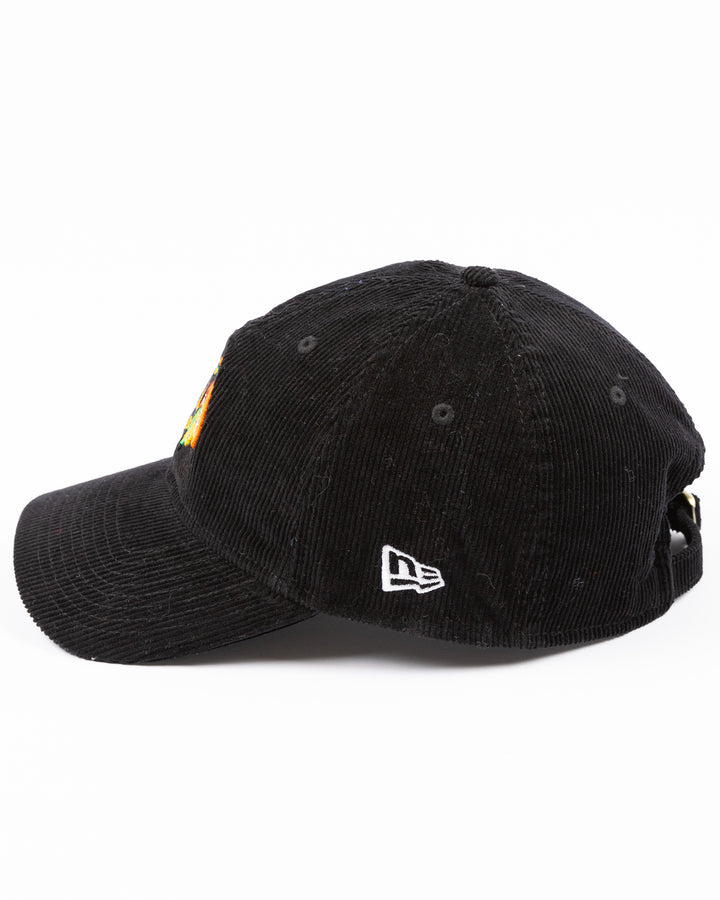 black corduroy New Era adjustable hat with embroidered Chicago Blackhawks primary logo on front - left side lay flat