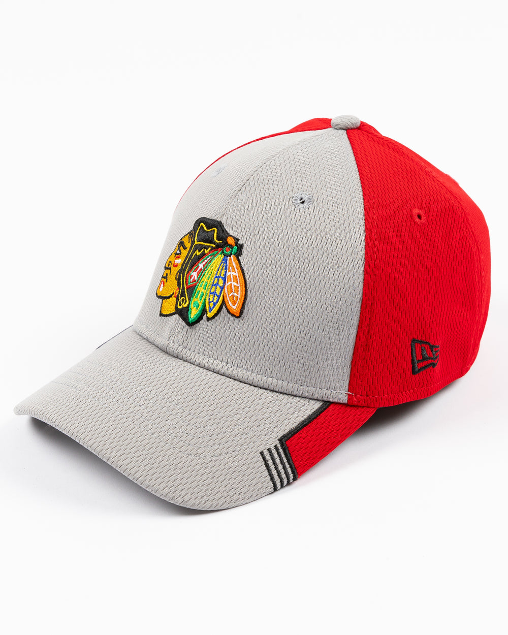 grey and red New Era fitted hat with Chicago Blackhawks primary logo embroidered on front - left angle lay flat