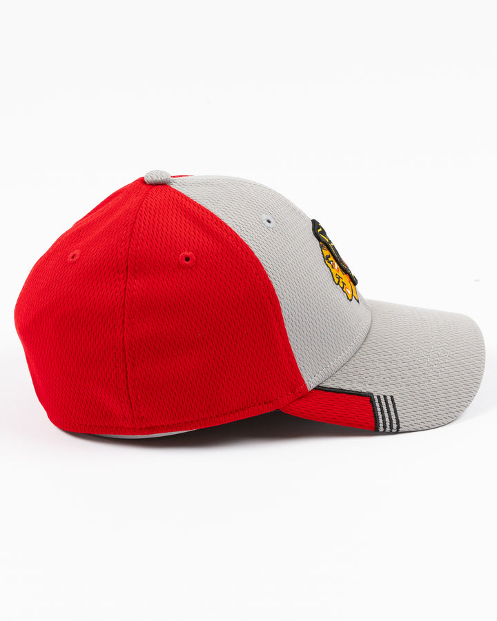 grey and red New Era fitted hat with Chicago Blackhawks primary logo embroidered on front - right side lay flat