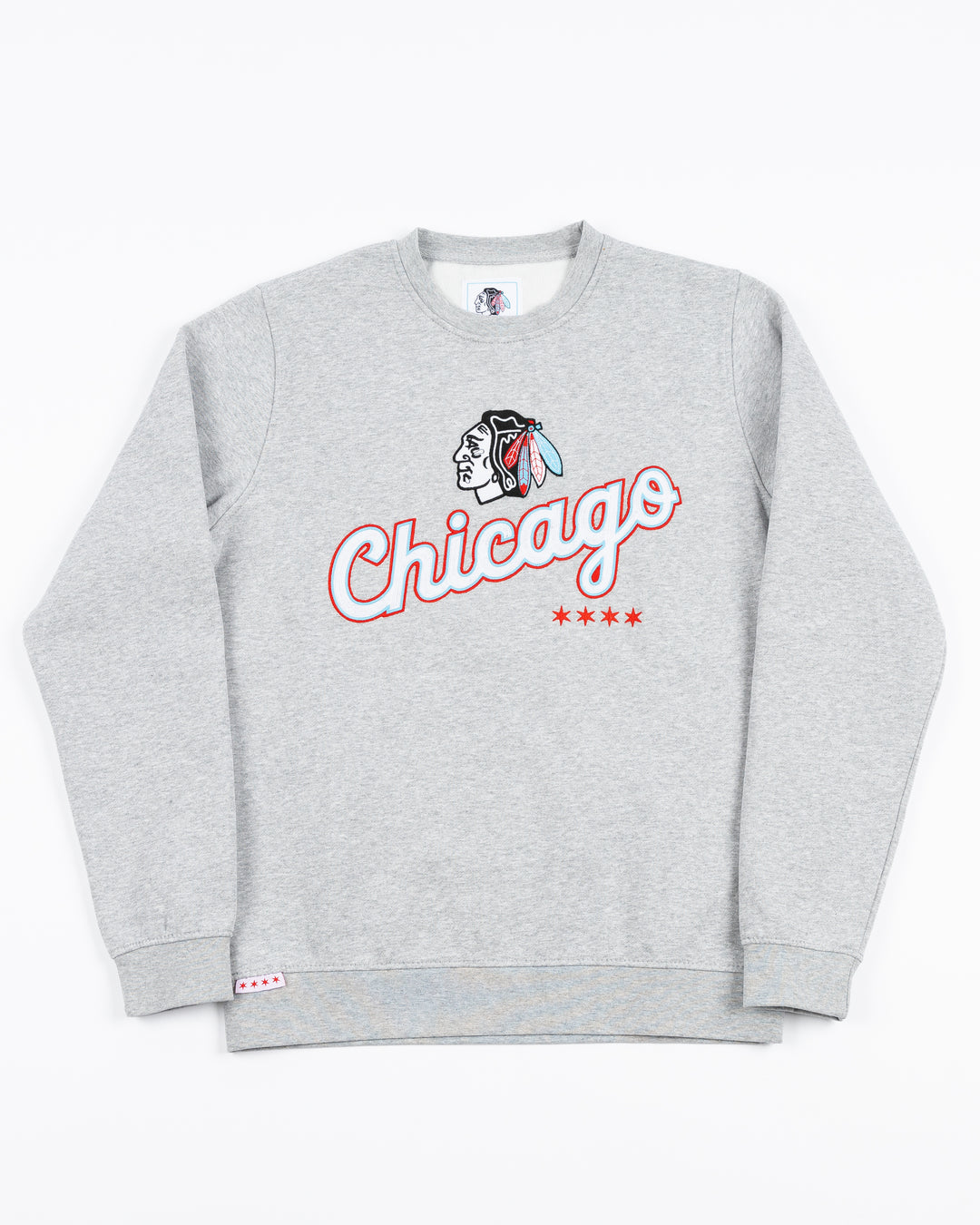 grey crewneck with Chicago script word graphic across front below Chicago Blackhawks primary logo in Chicago flag-inspired colorway - front lay flat