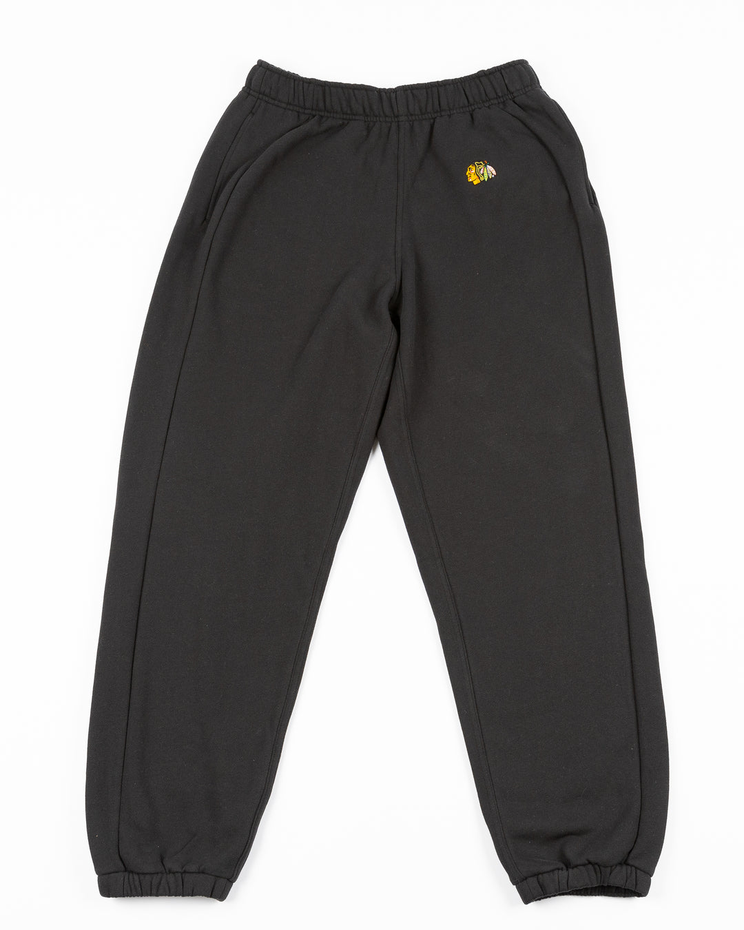 black lululemon women's oversized sweatpants with embroidered Chicago Blackhawks primary logo on left leg - front lay flat