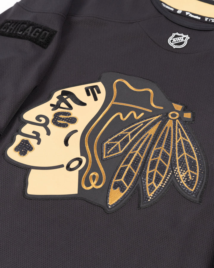 black and brown Fanatics military appreciation practice jersey with Chicago Blackhawks decoration - front detail lay flat