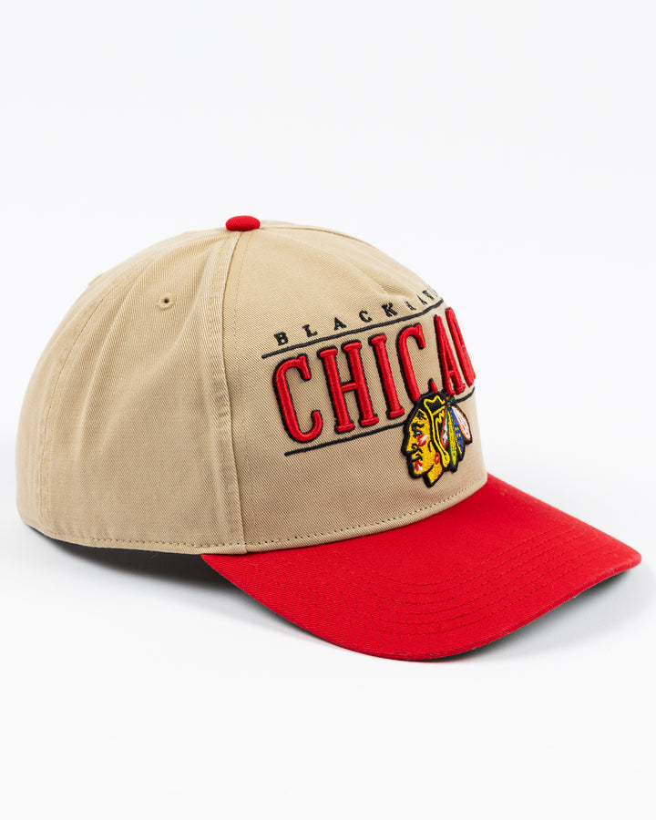 khaki '47 brand adjustable cap with Chicago Blackhawks wordmark and primary logo embroidered on front with red visor - right angle lay flat