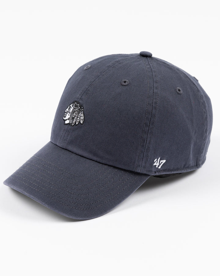 navy '47 brand clean up cap with mini tonal Chicago Blackhawks primary logo embroidered on front - left angle lay flat