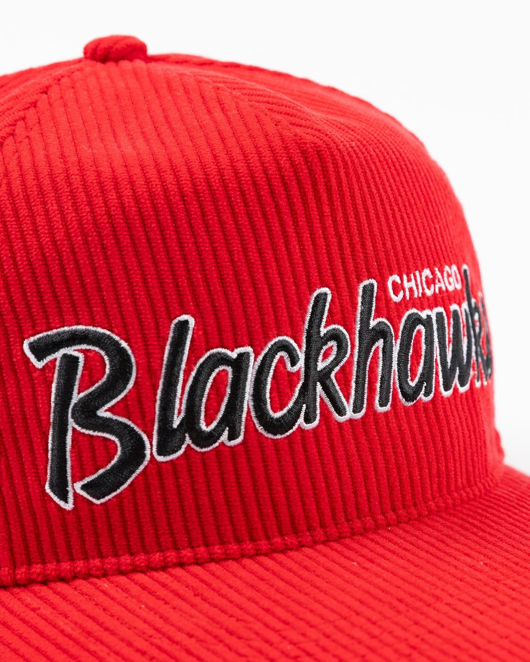 red corduroy '47 brand adjustable hat with embroidered Chicago Blackhawks wordmark on front and vintage logo on right side - front detail lay flat