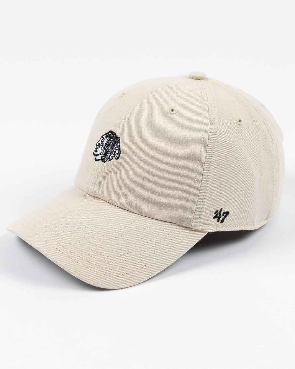 cream '47 brand clean up cap with mini tonal Chicago Blackhawks primary logo embroidered on front - left angle lay flat