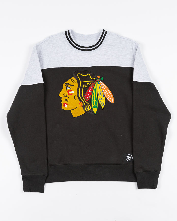 color blocked black and grey '47 brand crewneck with Chicago Blackhawks primary logo across front - front lay flat