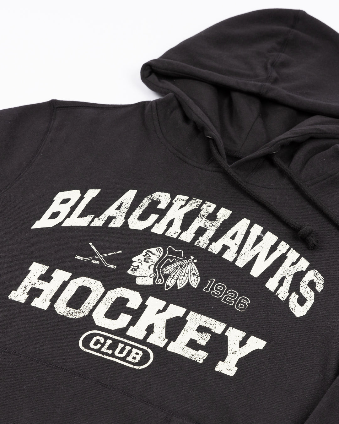 black '47 brand hoodie with Blackhawks Hockey club wordmark graphic and Chicago Blackhawks primary logo on front - front detail lay flat