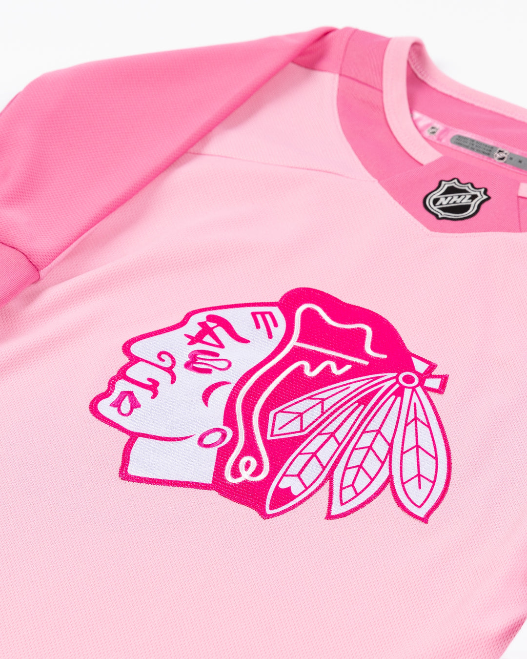 pink replica toddler Chicago Blackhawks hockey jersey with Bedard name and number- front detail lay flat