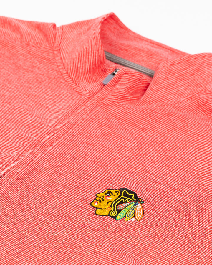 red johnnie-o quarter zip with embroidered Chicago Blackhawks primary logo on left chest - front detail lay flat